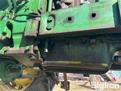 items/e62b7ae832dcef11b5427c1e522b8388/1963johndeere40102wdtractor-37_264009b88d224b5fb7abd6281624ed78.jpg