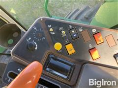 items/e77df35e490ef0119d476045bd488df1/1992-john-deere-9500-combine_8d8f3a73521740459d6d35ded26677cd.jpg