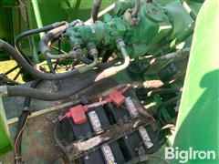 items/e77df35e490ef0119d476045bd488df1/1992-john-deere-9500-combine_c86f4faa74334b2096a4680a90d2c096.jpg