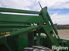 items/e91901e06236f011a2d97c1e52426054/2001-john-deere-6410-mfwd-tractor_254e1238dcb548308184dcfc6160500b.jpg