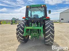 items/e91901e06236f011a2d97c1e52426054/2001-john-deere-6410-mfwd-tractor_8d5a2b9c01c74762b9d311ebec9e7af9.jpg