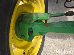 items/e91901e06236f011a2d97c1e52426054/2001-john-deere-6410-mfwd-tractor_aacf403348594c7fb3e9e7930c2b3e81.jpg