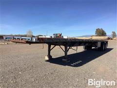 1985 Utility 48’ T/A Flatbed Trailer 