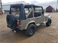 items/f31ee8f72490eb1189ee00155d424509/1989jeepwranglersahara2doorsportutilityvehicle_3eb02a3a169e47d2ad5756c05cdd7d64.jpg