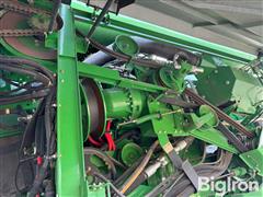 items/f59435e127a0ef1195f6002248918839/johndeeres690combine-2_4a8cb9c021de44b0971e6b34e910cf77.jpg