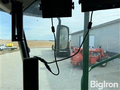 items/f59435e127a0ef1195f6002248918839/johndeeres690combine-2_5004491eb80c48a88fafd9b7a7129bc2.jpg