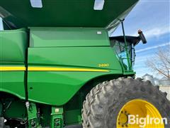 items/f59435e127a0ef1195f6002248918839/johndeeres690combine-2_61431b75872f4871a575c6024fb12cbf.jpg