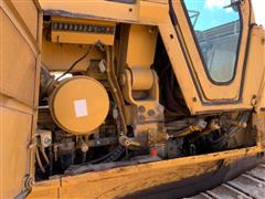 items/f677bbdfddcfed11a81c6045bd4cc723/caterpillar963btrackloader_e2a41a6b122142fd90937dbefbefbe4b.jpg