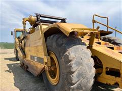 items/f771eeba8313ee11a81c000d3a61103f/caterpillar623eelevatedscraper_5e8c934f76c345f0a713e4cc8c23596e.jpg