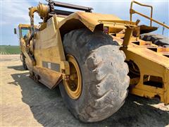 items/f771eeba8313ee11a81c000d3a61103f/caterpillar623eelevatedscraper_61f06db0119349caa9cdfa589f599464.jpg