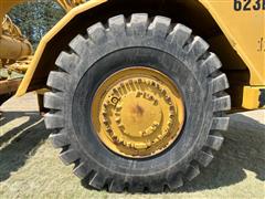 items/f771eeba8313ee11a81c000d3a61103f/caterpillar623eelevatedscraper_9011453e94884dcf80b3be6cd9f6a96a.jpg