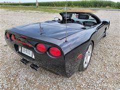 items/f93fdea9a603ec11b76a0003fff9404f/2001chevroletcorvetteconvertiblesportscar_02c04cad48c54ad4bd7e8029aa1440e0.jpg