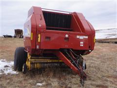 items/fd3e126d786bed11a76e0003fff9401b/newhollandspecialtycropbr70905x6roundbaler_158724e8b1474477ba8f094870fa9a24.jpg